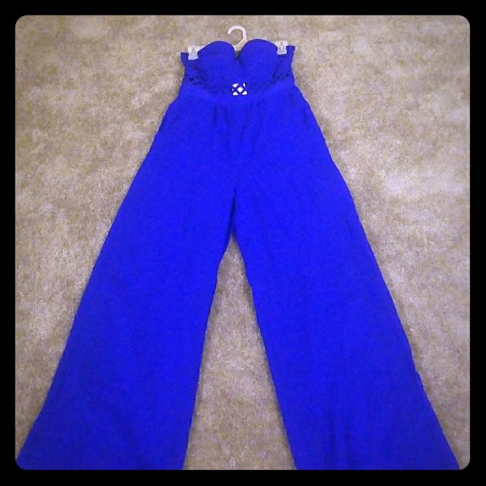 Cobalt blue jumpsuit with criss-cross detail